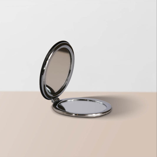 The Compact Mirror